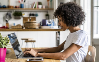 Woman working at home on a laptop